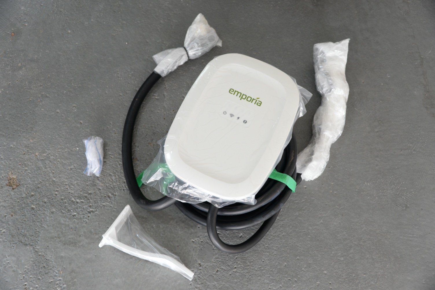 Emporia EV charger unboxing, on ground 