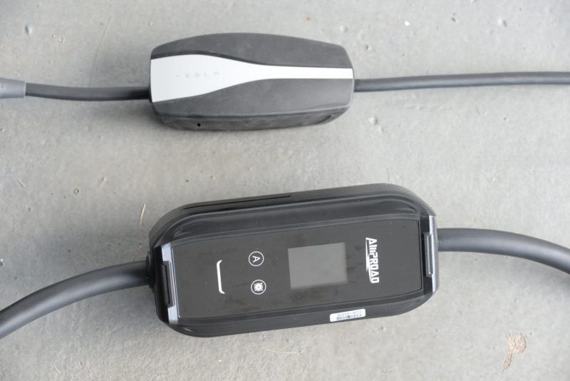 comparison of AMProad charger with tesla mobile connector