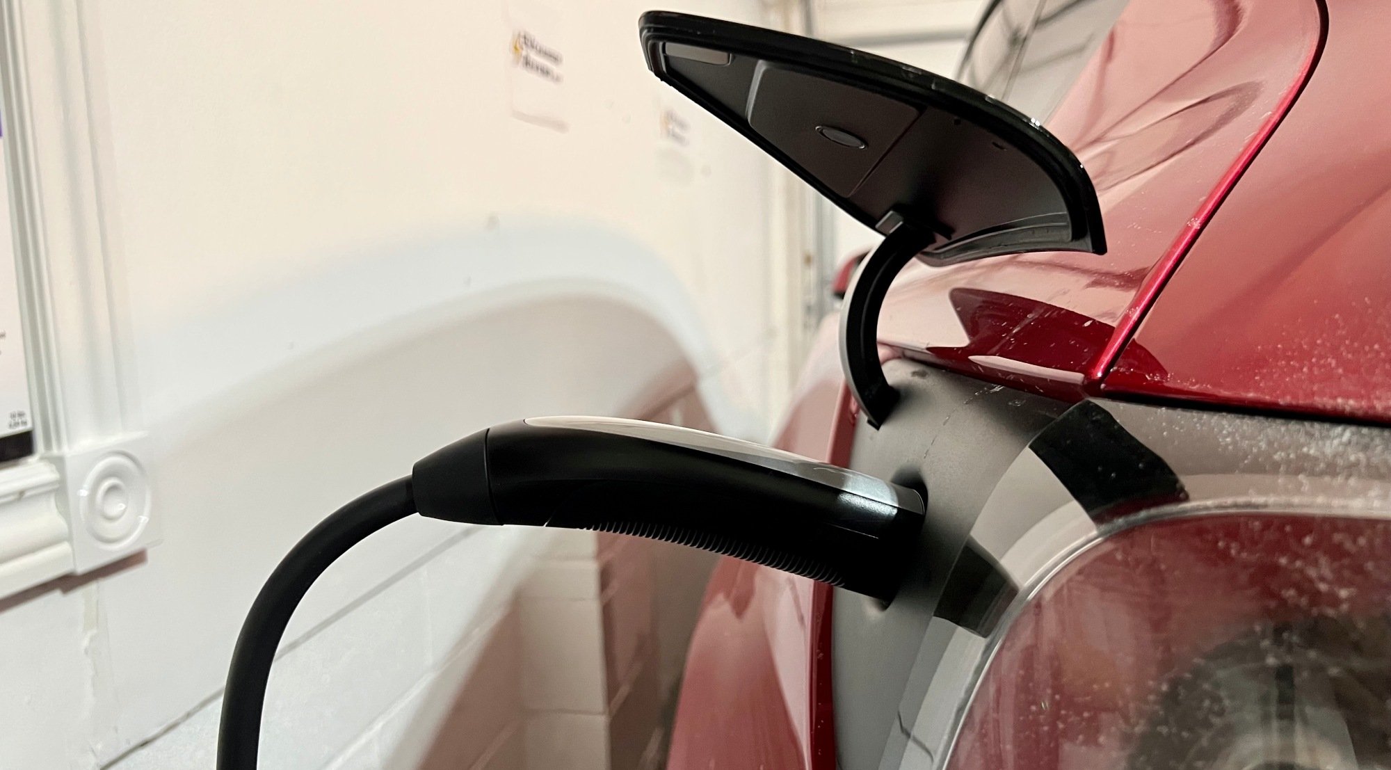 How to remove Tesla charging cable from the car