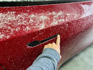 How to open frozen tesla door handles