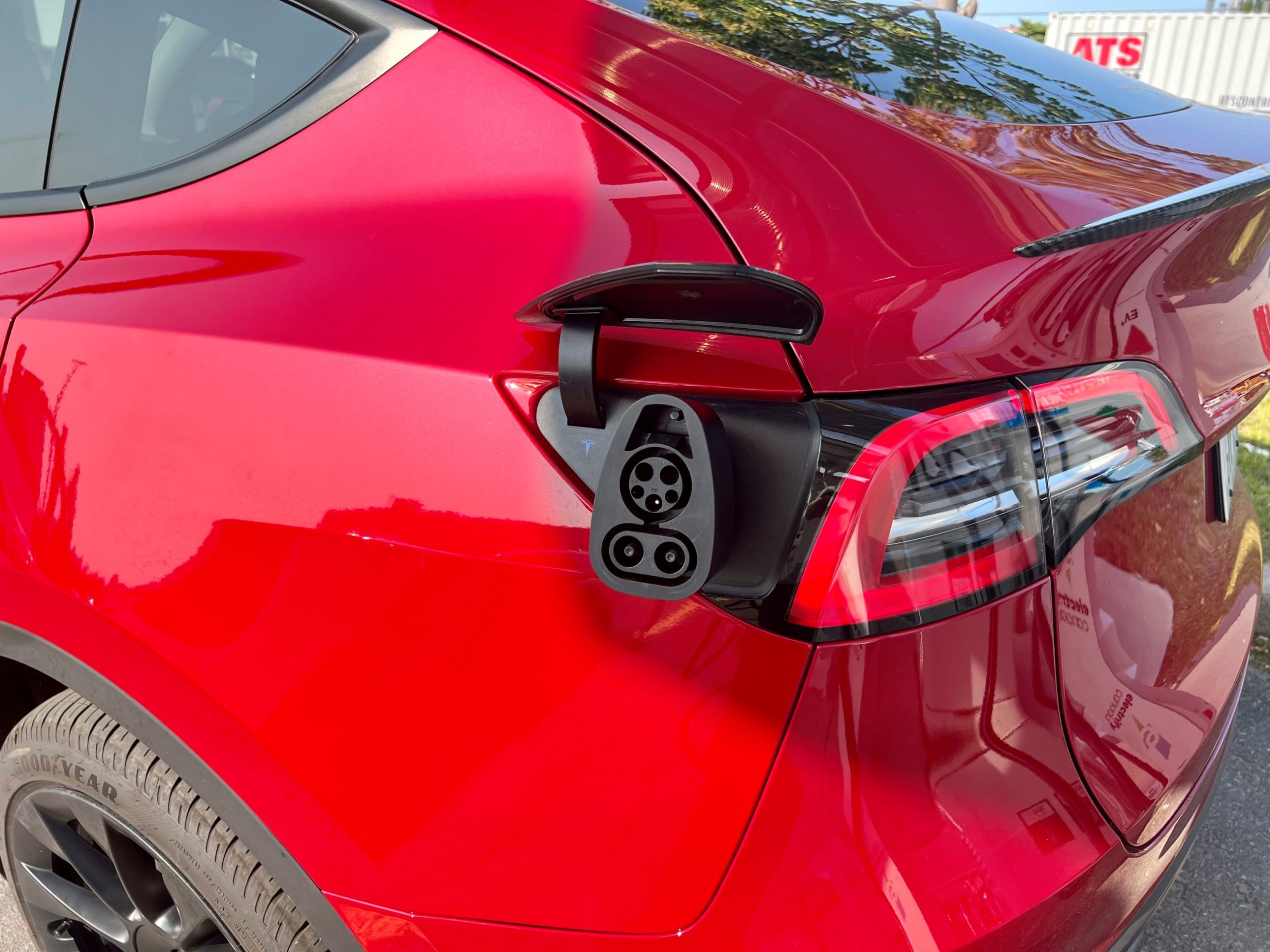 Model Y with CCS1 adapter for charging at Electrify Ameria