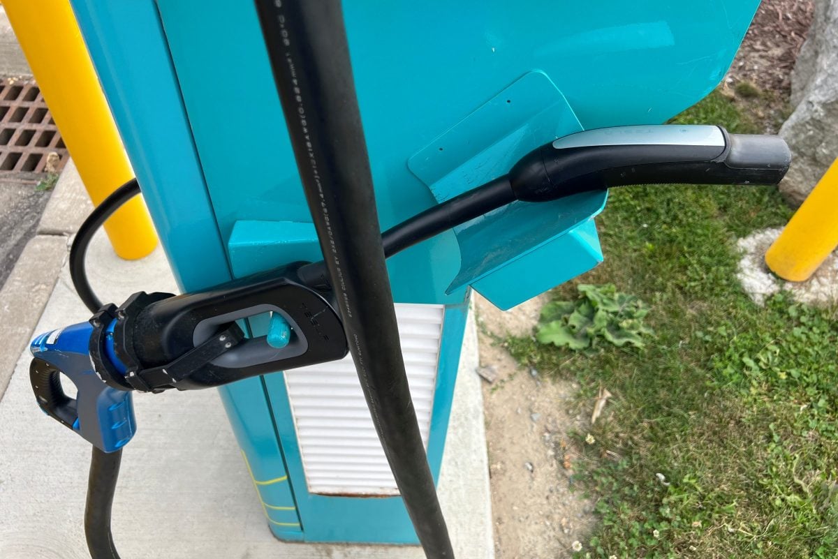 A Tesla plug at IVY is an old CHAdeMO connector with an adapter
