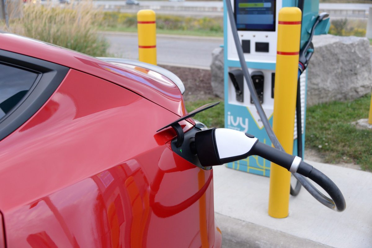 Tesla charging from a CCS connector, using an adapter, at an Ivy station