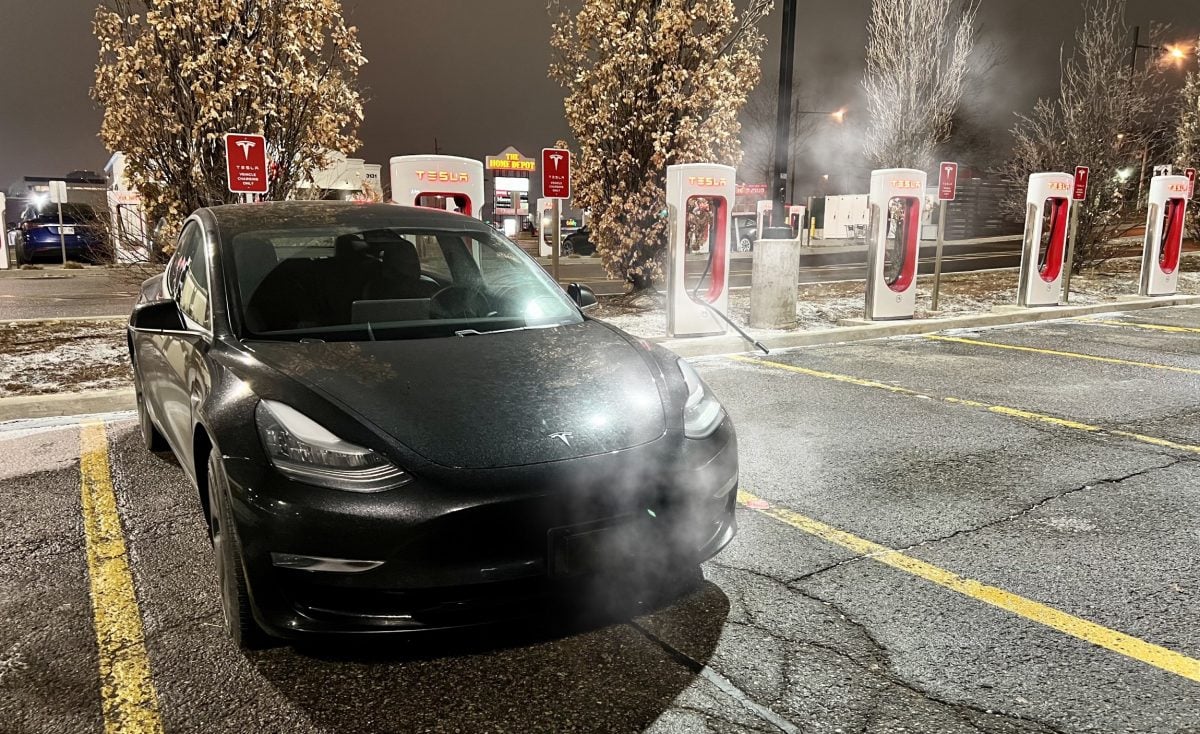 Steam exiting from the front of a Tesla while DC charging