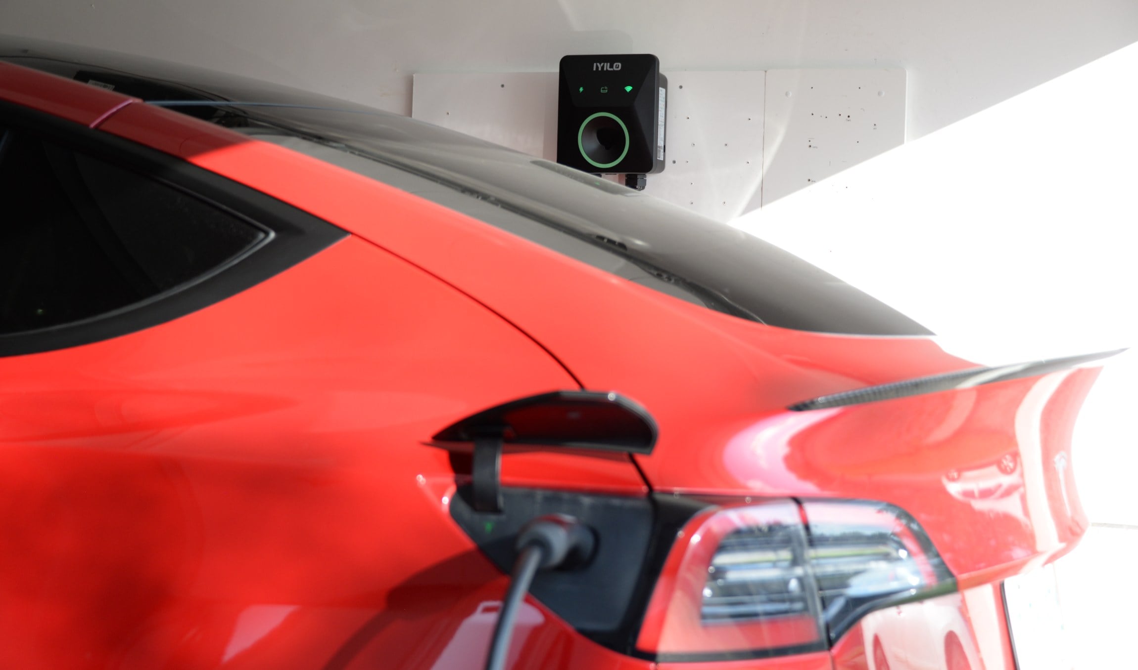 IYILO EV Charger with NACS, charging out Model Y test vehicle in our garage